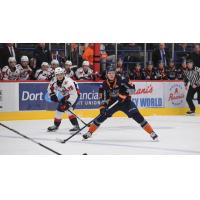 Windsor Spitfire's Cole Davis and Flint Firebirds' Matthew Mania on game night