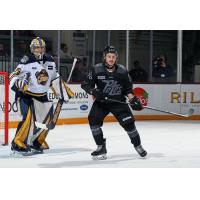 Erie Otters' Charlie Burns and Peterborough Petes' Quinton Page on game night