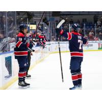 Saginaw Spirit forward Dimian Zhilkin (right)